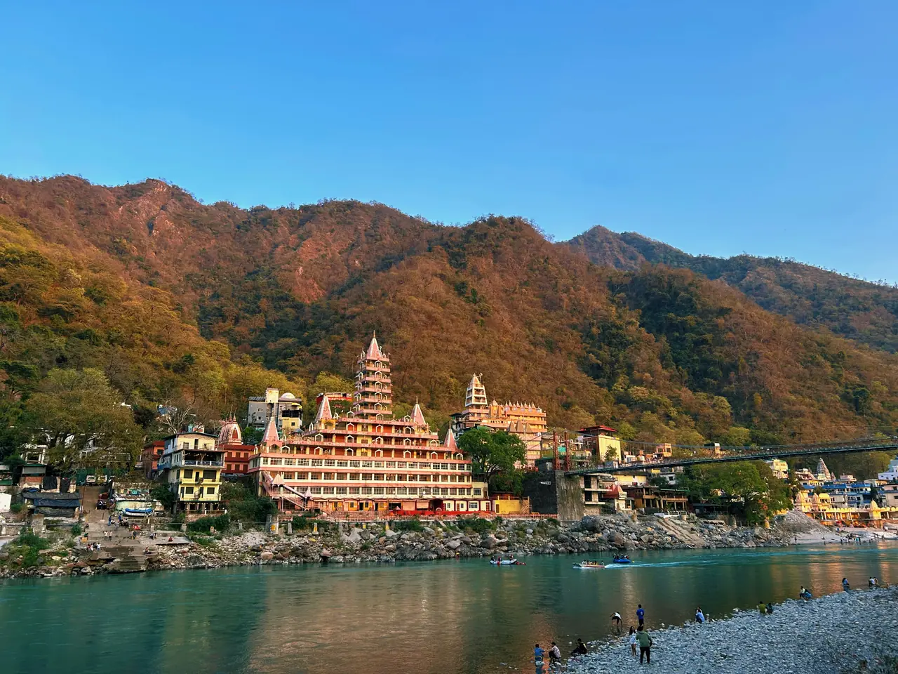The Ganga flowing through the forested hills of Rishikesh