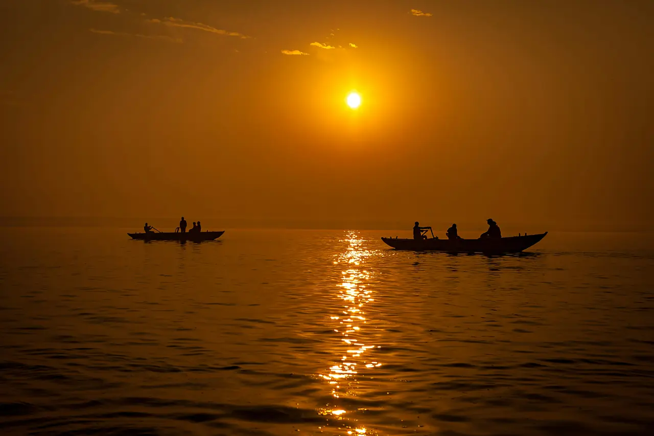 Boats on the Ganges at sunrise in Varanasi
